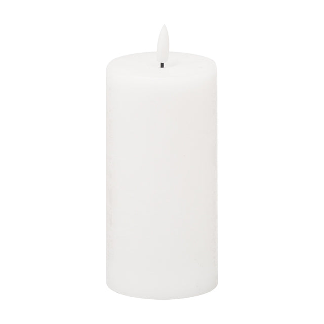 Hill Interiors Natural Glow LED wax pillar candle in beige, 15cm tall with a textured finish and flickering LED flame tip, shown on a plain white background.