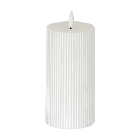 Hill Interiors Textured Ribbed LED Pillar Candle in beige with vertical grooves and a moulded flame tip, shown against a plain white background.