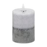 Hill Interiors Natural Glow Stone LED wax pillar candle in two-tone beige and grey with a flickering flameless tip, shown on a plain white background.