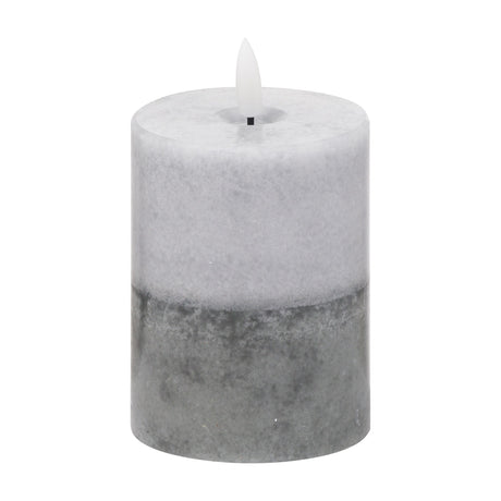 Hill Interiors Natural Glow Stone LED wax pillar candle in two-tone beige and grey with a flickering flameless tip, shown on a plain white background.