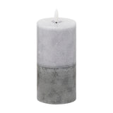 Hill Interiors Natural Glow Stone LED Pillar Candle in beige with a two-tone textured finish and flickering LED flame, shown on a plain white background.