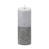 Hill Interiors Natural Glow Stone LED pillar candle in beige with a two-tone stone-effect finish and moulded flame tip, shown on a plain white background.