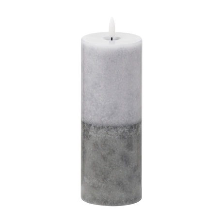 Hill Interiors Natural Glow Stone LED pillar candle in beige with a two-tone stone-effect finish and moulded flame tip, shown on a plain white background.