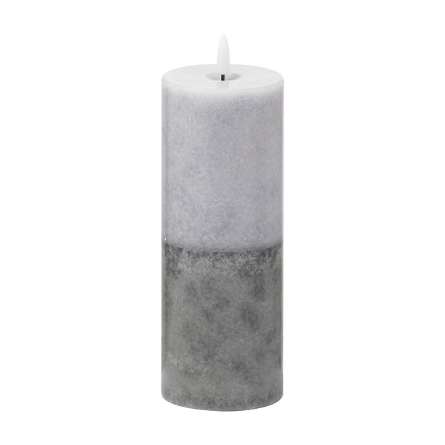 Hill Interiors Natural Glow Stone LED pillar candle in beige with a two-tone stone-effect finish and moulded flame tip, shown on a plain white background.