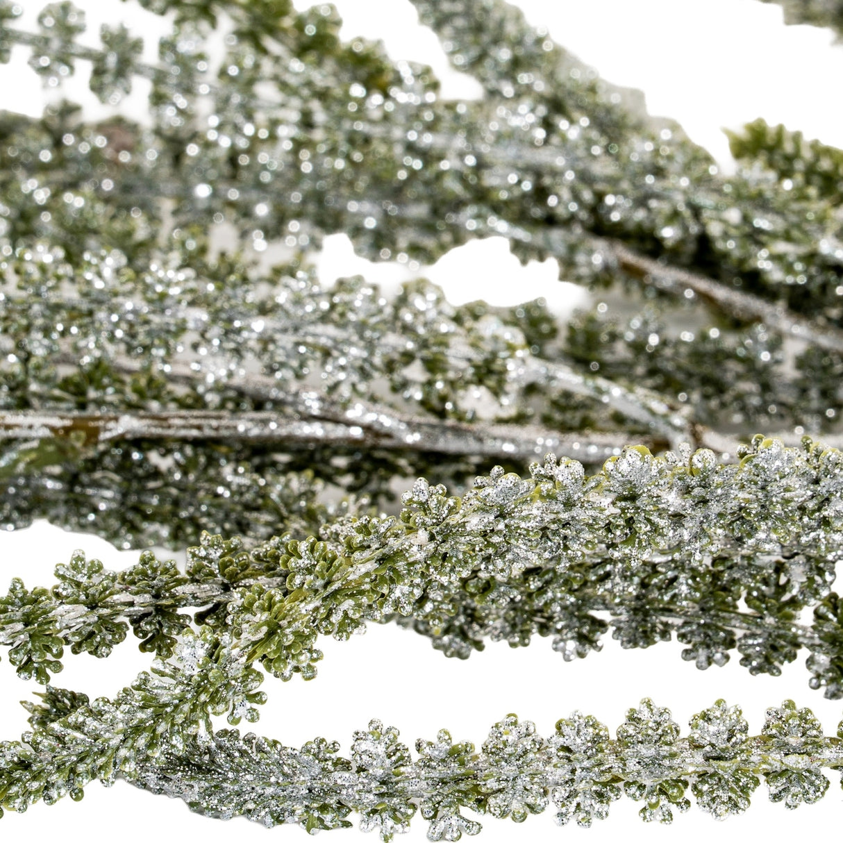 Close-up of the Hill Interiors Festive Amaranthus Trailing Stem showing green moulded plastic tassels dusted with silver glitter on slender trailing strands.