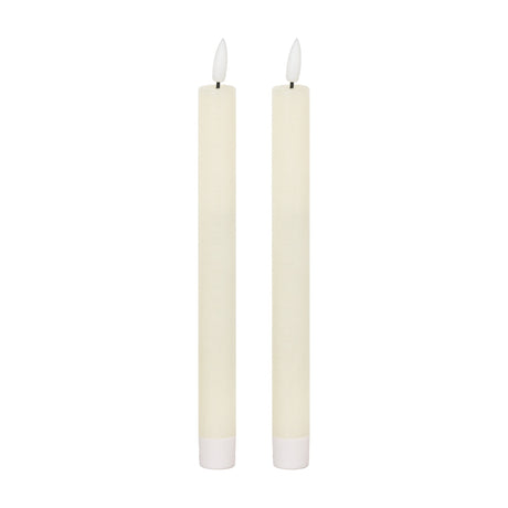 Hill Interiors Natural Glow LED Dinner Candles set of two in ivory-beige plastic with slim tapered bodies and warm flickering LED tips on a white background.
