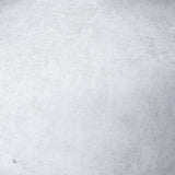 Close-up of the Hill Interiors Squat Stone Ceramic Vase in beige, showing its matte stone-effect finish and gently textured surface.