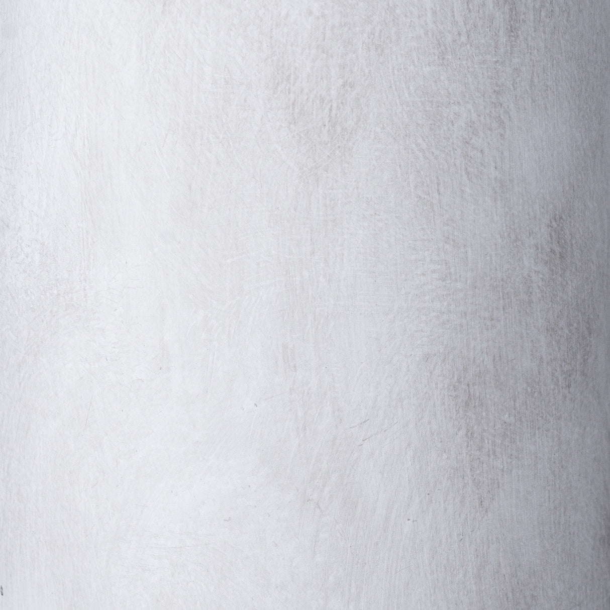 Close-up of the Hill Interiors Large Tall Ceramic Vase in beige, showing the soft matte glaze and subtle brushed texture across its rounded surface.