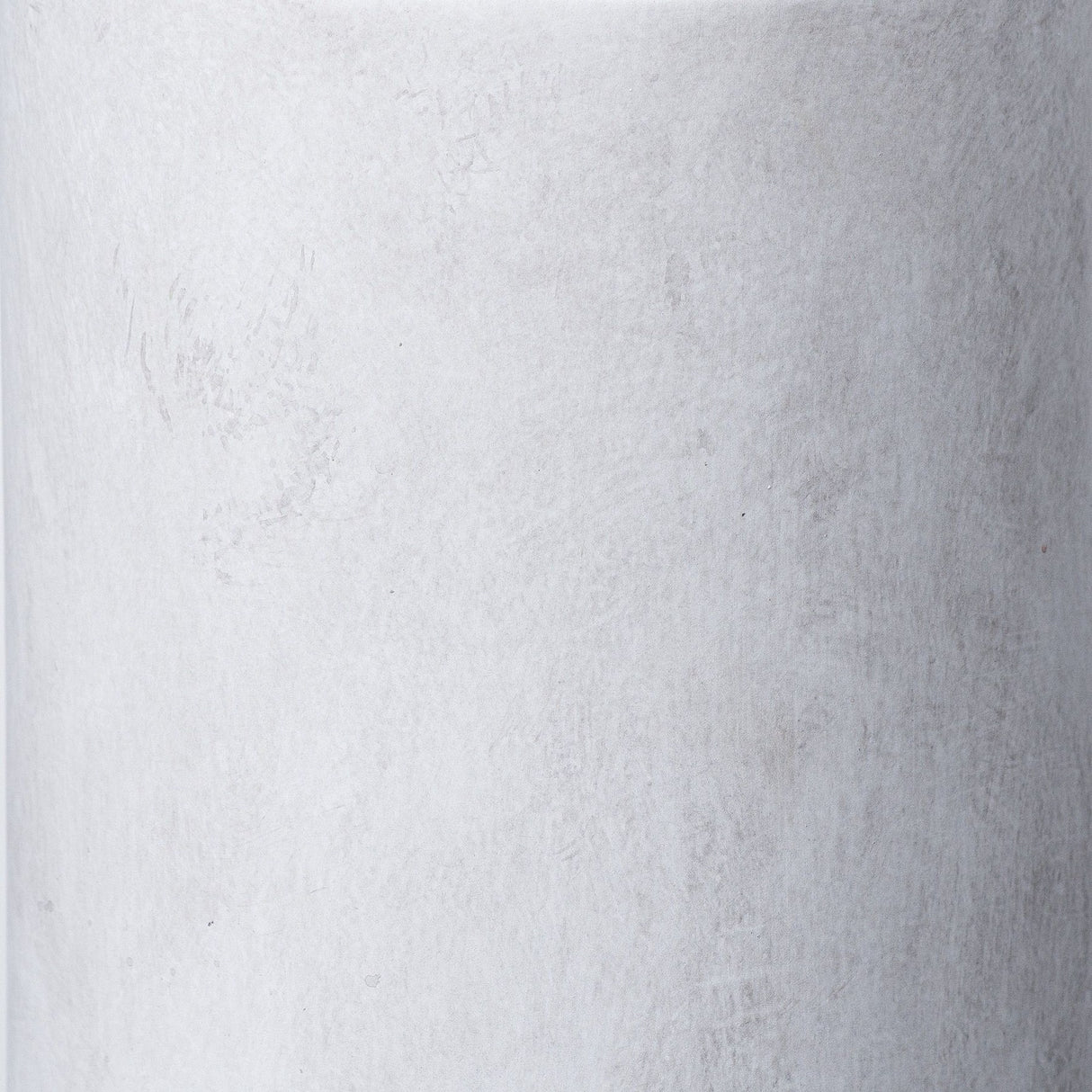 Close-up of the Hill Interiors Sutra Large Ceramic Vase in beige, showing the matte, chalky glaze and softly textured surface of the tapering form.