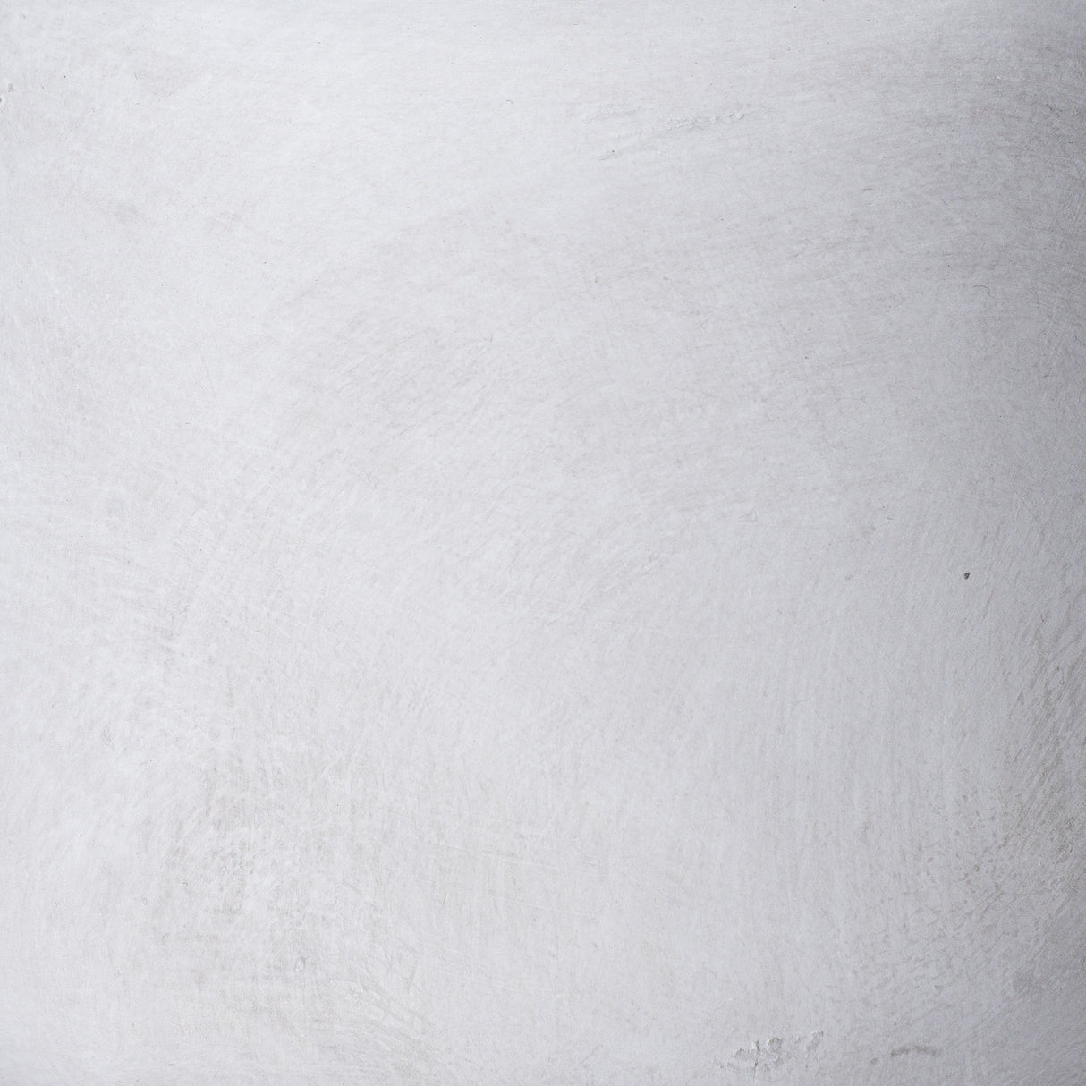 Close-up of the Hill Interiors Opal ceramic vase showing the smooth, glazed beige surface with soft brushstroke texture across the rounded body.