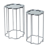 Hill Interiors Quatrefoil Mirrored Set of Two Side Tables in silver, with metal quatrefoil-shaped frames and mirrored tops, on a plain white background.