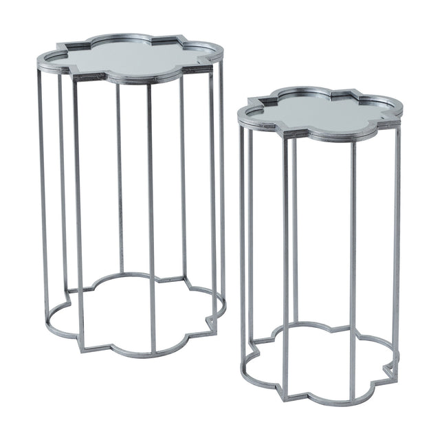 Hill Interiors Quatrefoil Mirrored Set of Two Side Tables in silver, with metal quatrefoil-shaped frames and mirrored tops, on a plain white background.
