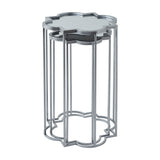Hill Interiors Quatrefoil mirrored set of two nesting side tables in silver, with metal frames in a quatrefoil silhouette and mirrored tops.