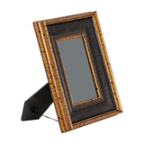 Hill Interiors black and antique gold beaded photo frame upright with rear strut, showing distressed wooden border on a white background.