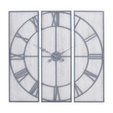 Hill Interiors Panelled Metal Wall Clock in silver, three-panel design with open Roman numeral dial and central hands on a plain background.