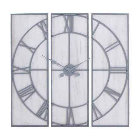 Hill Interiors Panelled Metal Wall Clock in silver, three-panel design with open Roman numeral dial and central hands on a plain background.
