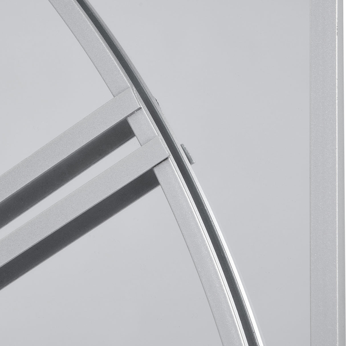 Close-up detail of the Hill Interiors Mirrored Round Wall Clock 112cm in silver, showing the slim metal frame bars against the reflective mirrored glass face.