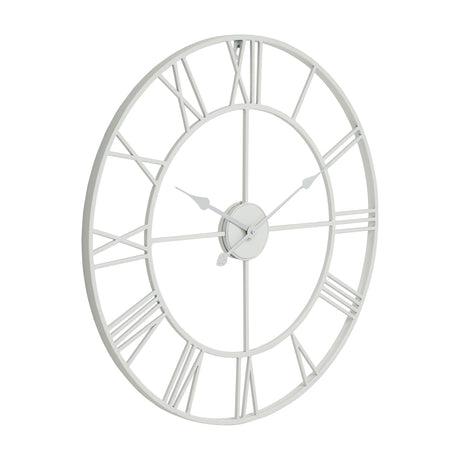 Hill Interiors White Skeleton Metal Wall Clock with cut-away Roman numeral face and slender hands, shown at an angle on a plain white background.