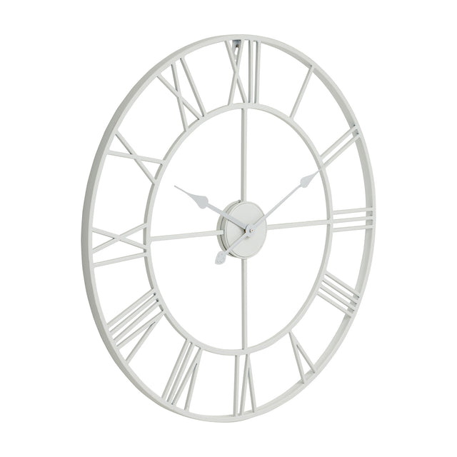 Hill Interiors White Skeleton Metal Wall Clock with cut-away Roman numeral face and slender hands, shown at an angle on a plain white background.