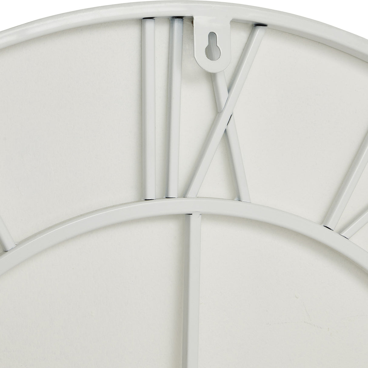 Close-up of the Hill Interiors White Skeleton Metal Wall Clock showing the white metal frame edge, slim bars and keyhole fixing on the reverse.
