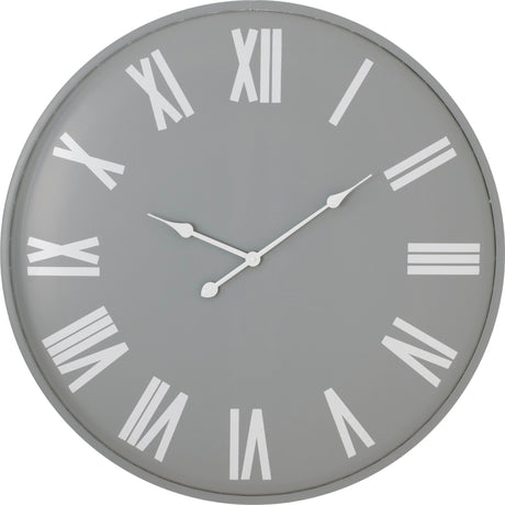 Hill Interiors large round metal wall clock in soft grey with white Roman numerals and slim hands, shown against a plain background.