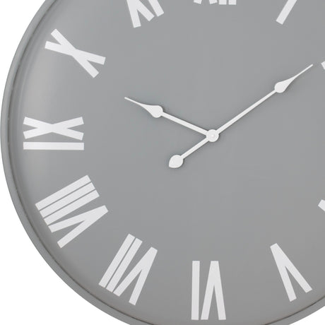 Close-up of the Hill Interiors Large Round Metal Wall Clock in grey, showing white Roman numerals and slim white hands on the dial.