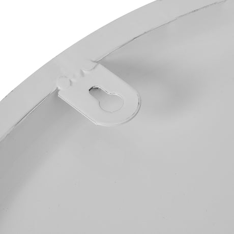 Close-up of the metal keyhole hanging bracket on the back of the Hill Interiors White Round Metal Wall Clock, showing the white finish.