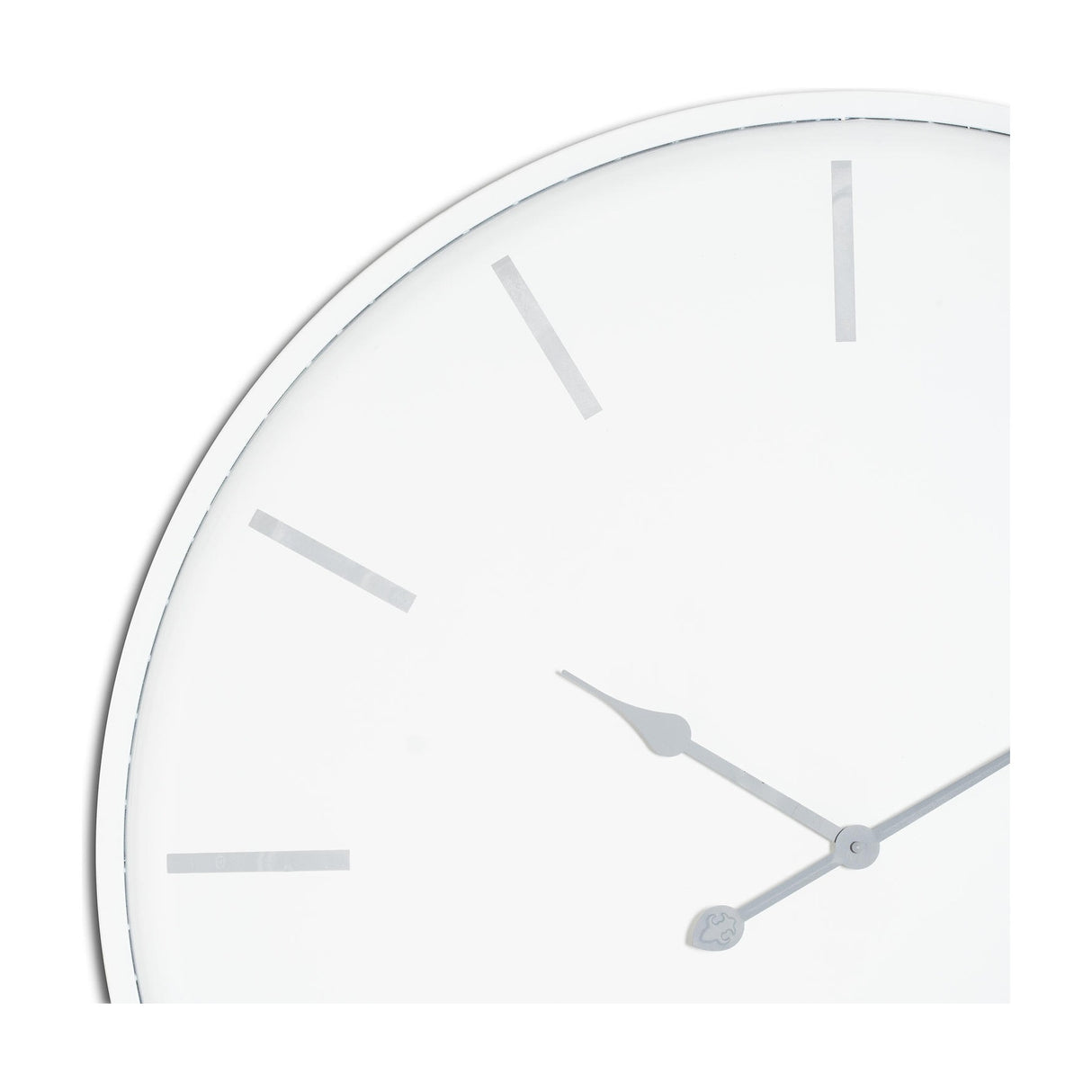 Close-up of the Hill Interiors Large Round Metal Wall Clock in white, showing the minimal dial with slim silver hour markers and pointed hands.