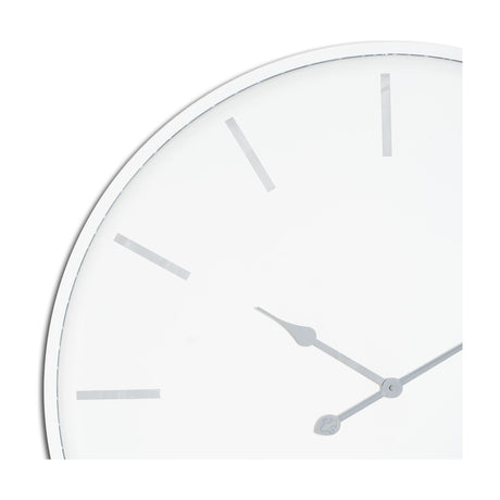 Close-up of the Hill Interiors Large Round Metal Wall Clock in white, showing the minimal dial with slim silver hour markers and pointed hands.