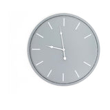 Hill Interiors Round Metal Wall Clock in grey with slim white hands and marker indices on a plain white background.
