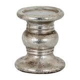 Hill Interiors Large Punch-Faced Ceramic Candle Holder in silver, with a dimpled metallic glaze, rounded pedestal form and wide base, on a white background.