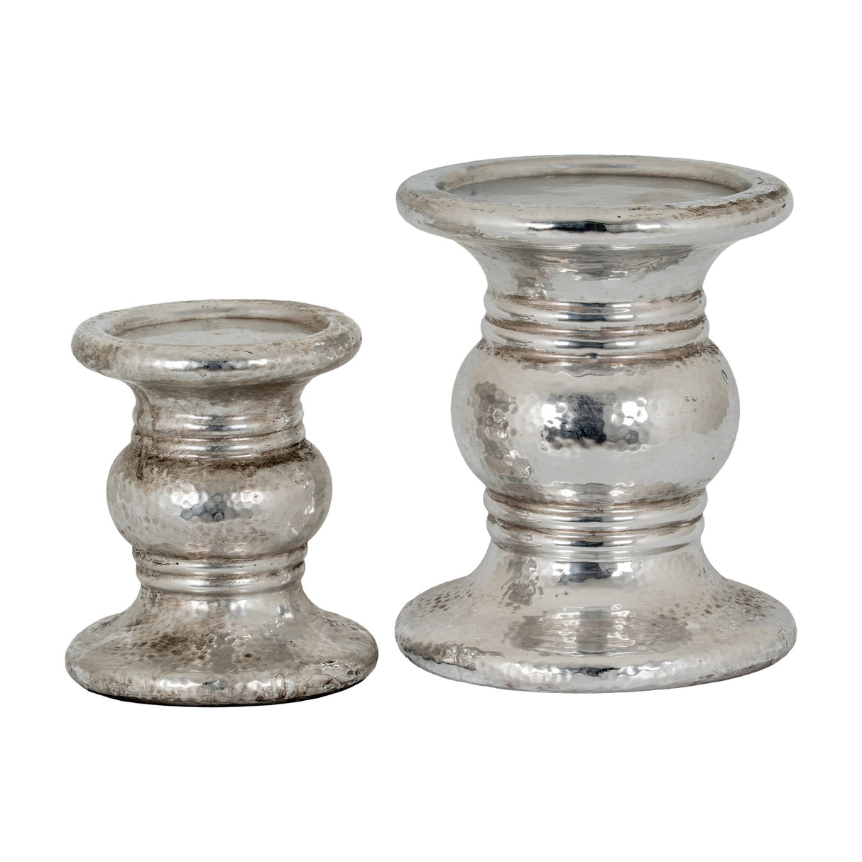 Hill Interiors Large Punch-Faced Ceramic Candle Holder in silver shown beside a smaller version, both with dimpled metallic glaze, on a plain white background.