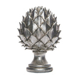 Hill Interiors Silver Ceramic Pinecone Finial with layered scale-like petals on a rounded pedestal base, shown against a plain white background.