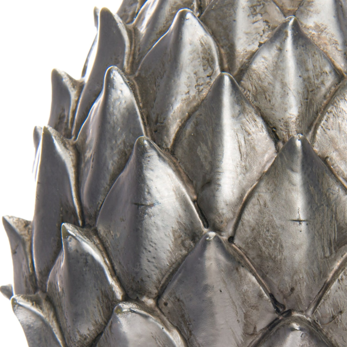 Close-up of the Hill Interiors Large Ceramic Pinecone Finial in silver, showing overlapping diamond-shaped scales with a soft glazed sheen.