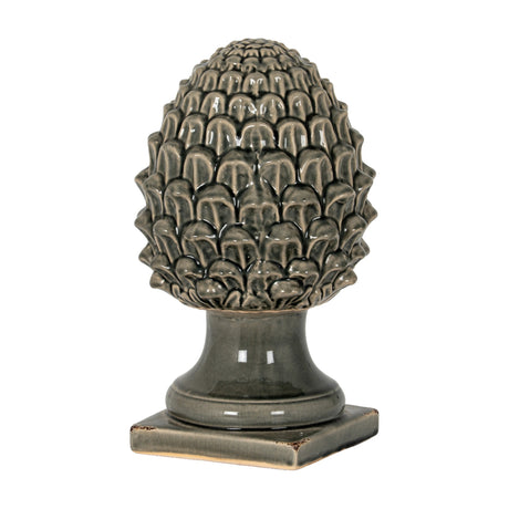 Hill Interiors grey ceramic decorative acorn with textured layered cap and smooth pedestal base on a square foot, shown on a white background.