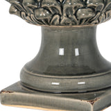 Close-up of Hill Interiors Decorative Ceramic Acorn in grey, showing the glazed pedestal base and textured cap detailing against a plain white background.