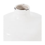 Hill Interiors Glazed Eve ceramic vase in white with a rounded body, short narrow neck, and distressed dark flecks around the rim.