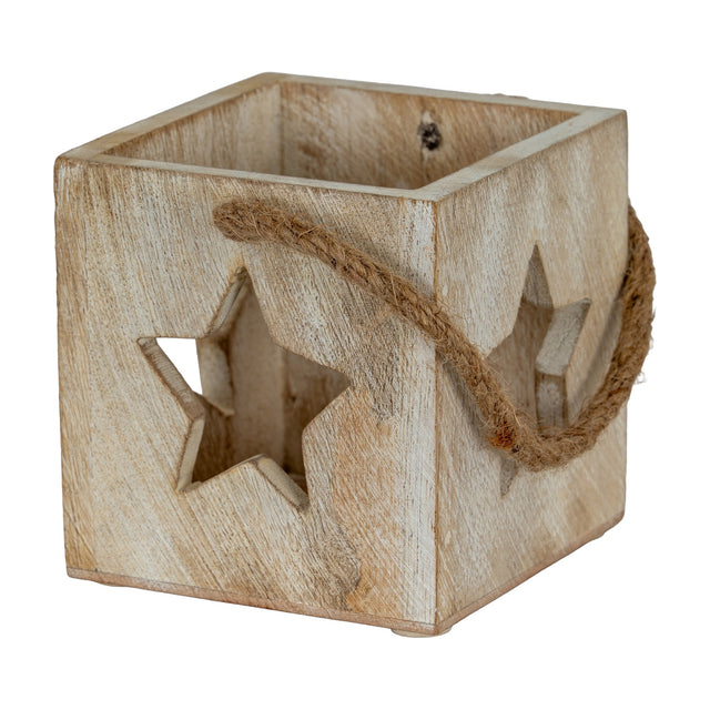 Hill Interiors washed wood tealight holder in white with cube form, star cut-outs on the sides and a jute rope handle, on a plain background.