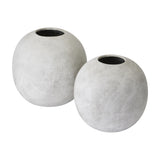 Two Hill Interiors Small Globe ceramic vases in matte beige with spherical bodies and narrow openings, shown on a plain white background.