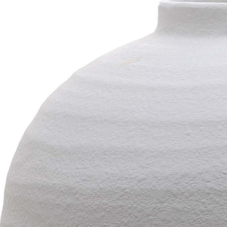 Close-up of the Hill Interiors Matt White Ceramic Vase showing its rounded body, textured matt white finish and short neck against a plain background.