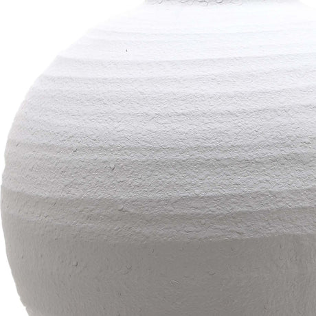 Close-up of the Hill Interiors Large Matt White Ceramic Vase showing its rounded body and softly textured matt white finish against a plain background.
