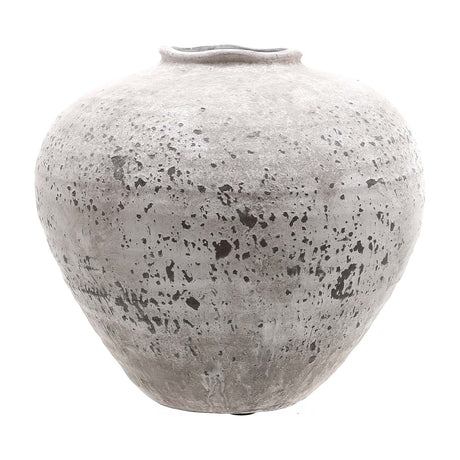 Hill Interiors Stone Ceramic Vase in beige with a rounded urn shape, narrow mouth and chalky, textured matt finish, on a plain white background.