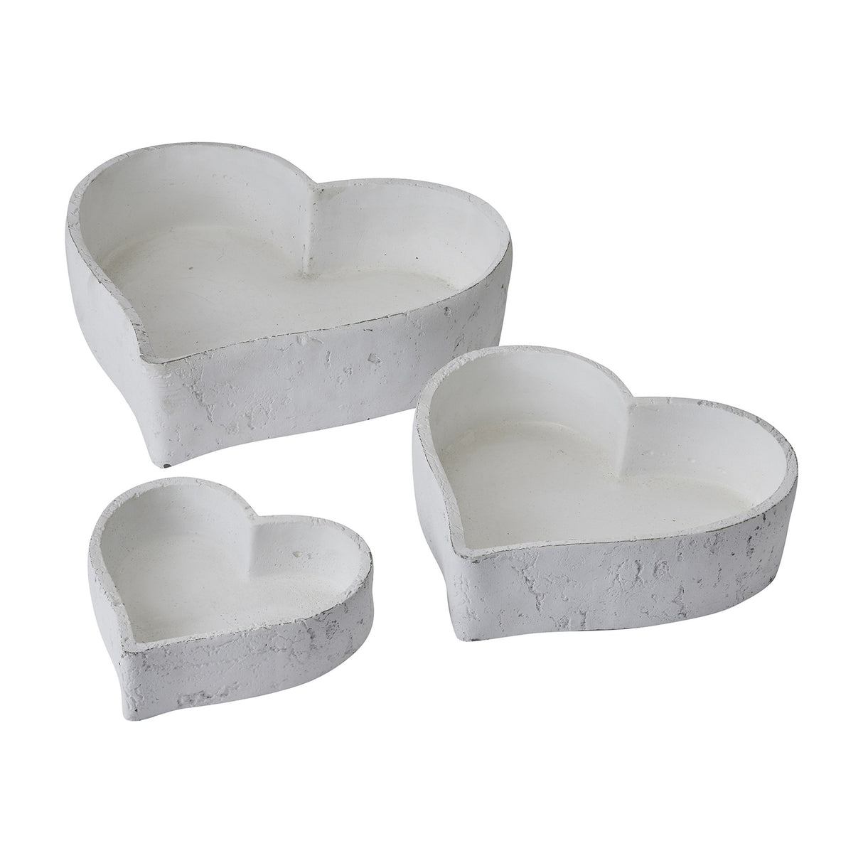 Hill Interiors set of three matt white ceramic heart-shaped decorative bowls in graduated sizes, shown on a plain white background.