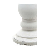 Close-up of the Hill Interiors Matt White Ceramic Candle Holder base, showing the turned pedestal form with chalky matt white glaze on a plain background.