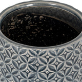 Close-up of Hill Interiors Ceramic Planter 15cm showing embossed geometric floral pattern in glazed grey with a dark speckled interior.
