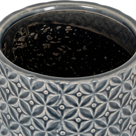 Close-up of Hill Interiors Ceramic Planter 15cm showing embossed geometric floral pattern in glazed grey with a dark speckled interior.