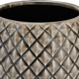 Close-up of Hill Interiors Diamond Textured Ceramic Planter in grey, showing the raised diamond pattern, glossy glaze, and dark interior.