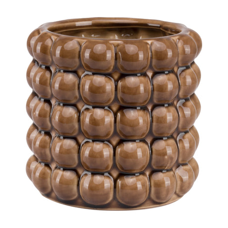 Hill Interiors Bubble Ceramic Planter in warm caramel brown with glossy raised bubble texture and rounded form, shown against a plain white background.