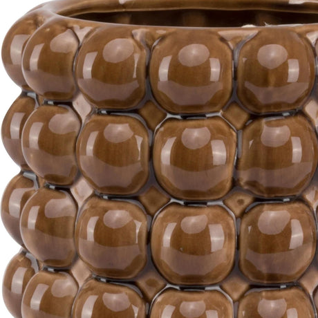 Close-up of Hill Interiors Large Ceramic Bubble Planter in caramel brown, showing the glossy glazed surface and rows of rounded bubble texture.