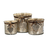 Hill Interiors Mercury Glass Heart candle holders in three sizes, each with mottled silvered finish, twine bows and hanging metal heart charms, on white.